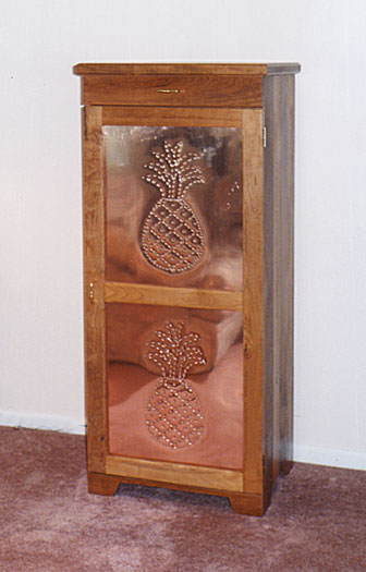 audio cabinet in the style of a pie safe